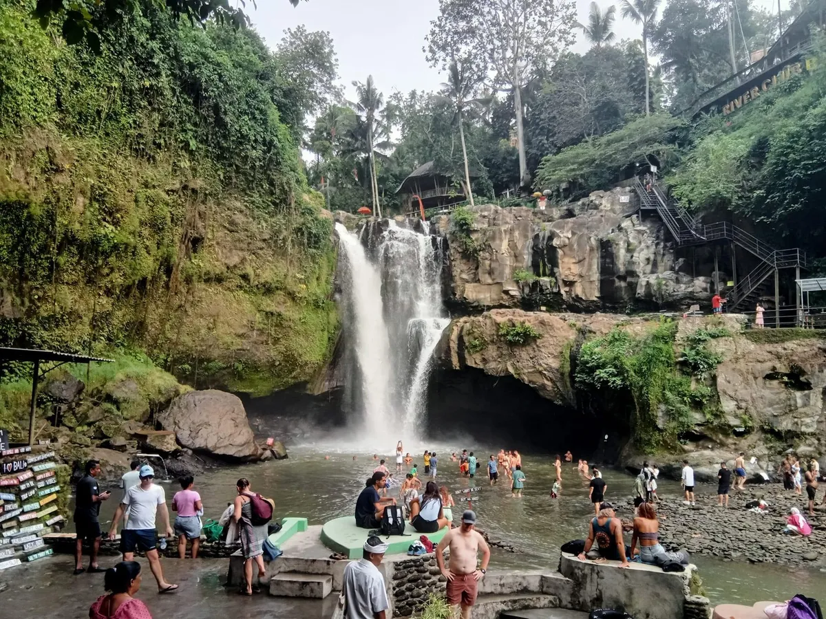 The wide curtain of Tegenungan Waterfall falling into its pool